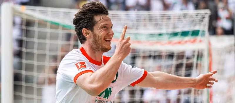 Augsburg have announced that they have triggered Michael Gregoritsch's buy-out option, extending the player's contract until the summer of 2027.